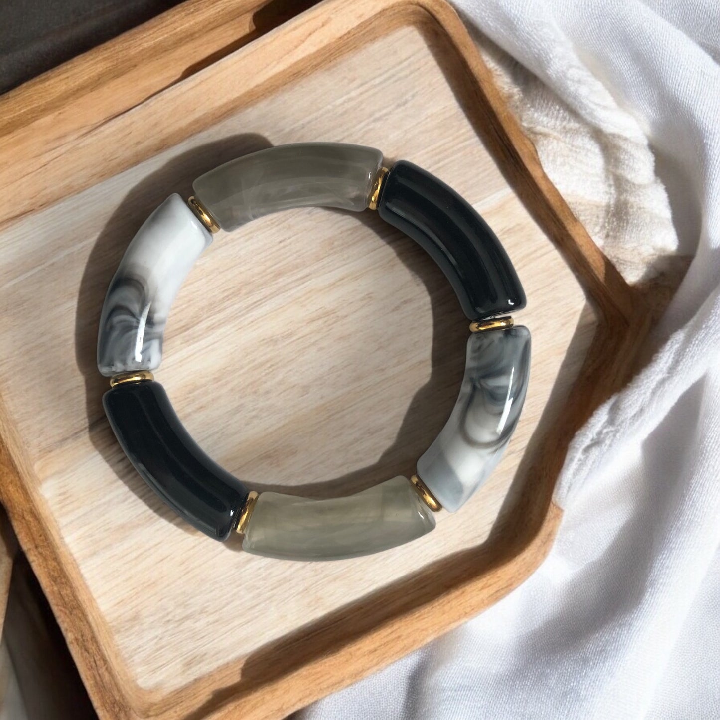 Bracelet tube ton noir et blanc