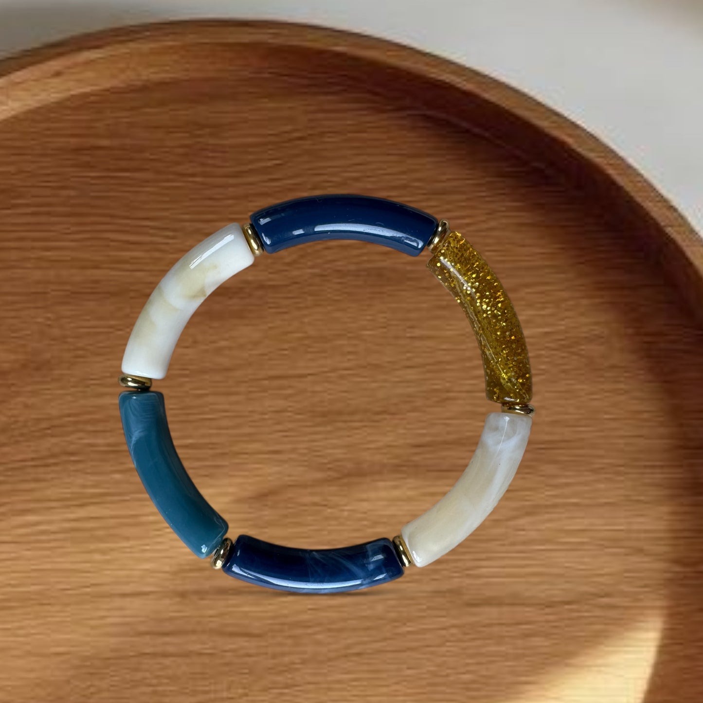Bracelet petite perles tubes ton bleu marine